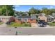 Charming brick home with manicured lawn and solar panels on roof at 1145 Forest Dr., North Myrtle Beach, SC 29582