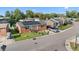 Street view of charming brick home with solar panels and well-maintained lawn at 1145 Forest Dr., North Myrtle Beach, SC 29582