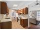 An eat-in kitchen featuring laminate countertops, light brown cabinets and natural light at 1145 Forest Dr., North Myrtle Beach, SC 29582