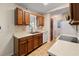 Eat-in kitchen with laminate countertops and light brown cabinets at 1145 Forest Dr., North Myrtle Beach, SC 29582
