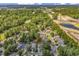 This aerial view highlights the home's prime location within a lush and welcoming community at 1208 Trisail Ln, North Myrtle Beach, SC 29582