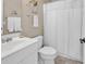 Well-maintained bathroom with a white vanity and shower-tub combination at 1208 Trisail Ln, North Myrtle Beach, SC 29582