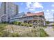 Exterior community beach house, with deck access, and beach views at 1208 Trisail Ln, North Myrtle Beach, SC 29582