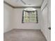 Empty bedroom featuring a window, neutral paint, and closet space at 1208 Trisail Ln, North Myrtle Beach, SC 29582