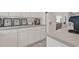 Clean, well-maintained kitchen with white cabinets and tiled floors at 1208 Trisail Ln, North Myrtle Beach, SC 29582