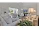 Bright and airy living room featuring comfortable seating and natural light at 1208 Trisail Ln, North Myrtle Beach, SC 29582
