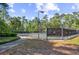 The community features well-maintained tennis courts surrounded by lush greenery and mature trees at 1208 Trisail Ln, North Myrtle Beach, SC 29582