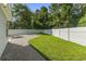 Fenced backyard with grass and hardscape featuring a privacy fence and a manicured yard at 1331 Bermuda Ct., Surfside Beach, SC 29575