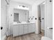 Bathroom featuring a dual sink vanity, subway tile shower, and modern fixtures at 1331 Bermuda Ct., Surfside Beach, SC 29575