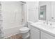 This pristine bathroom features a shower-tub combo, a toilet, and a vanity with ample countertop space at 1331 Bermuda Ct., Surfside Beach, SC 29575