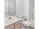 Bathroom featuring light wood cabinets, a shower with shower curtain, and a sink with a clear faucet at 1331 Bermuda Ct., Surfside Beach, SC 29575