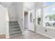 Inviting entryway featuring stairs and a large window providing an abundance of natural light at 1331 Bermuda Ct., Surfside Beach, SC 29575