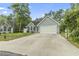 Charming home with a two-car garage and a well-maintained lawn at 1331 Bermuda Ct., Surfside Beach, SC 29575