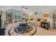 Comfortable living room with plush seating, decorative rug, and ample natural light at 139 Olde Canal Loop, Pawleys Island, SC 29585