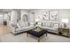 Inviting living room featuring neutral-toned furniture, stylish decor, and ample natural light at 1408 Whistling Straits Way, Sunset Beach, NC 28468