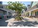 Exterior view of retail stores with covered sidewalks, landscaping, and seating area at 1416 Edge Dr., North Myrtle Beach, SC 29582