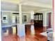 Spacious living room with hardwood floors, a column feature, and plenty of natural light at 1421 Shoreline Dr., Myrtle Beach, SC 29577