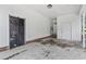 Clean garage with white walls and concrete floor, providing ample space for parking and storage at 169 Ole Maple St., Loris, SC 29569