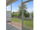 A clear view of the landscaped backyard from the screened porch at 184 Sea Shell Dr. # 12, Murrells Inlet, SC 29576