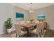 Formal dining room featuring coastal decor and a modern chandelier at 184 Sea Shell Dr. # 12, Murrells Inlet, SC 29576