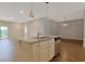 Kitchen with an island featuring a sink, plus stainless steel appliances and ample cabinet space at 184 Sea Shell Dr. # 12, Murrells Inlet, SC 29576