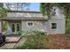 The backyard has a quaint porch that offers a private retreat with views of the surrounding greenery at 1930 Lake View Circle, Myrtle Beach, SC 29575