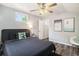Bedroom with wood-look floors and warm, inviting lighting at 1930 Lake View Circle, Myrtle Beach, SC 29575