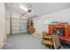 Garage interior with an automatic door, window, and room for parking and storage at 1930 Lake View Circle, Myrtle Beach, SC 29575