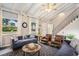 Cozy living room featuring vaulted ceiling, staircase, and comfortable seating arrangements at 1930 Lake View Circle, Myrtle Beach, SC 29575
