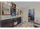 Spacious bathroom with double vanity, granite countertop, and a walk-in closet at 200 Silverbelle Blvd., Longs, SC 29568