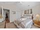 Comfortable bedroom featuring vaulted ceilings, a ceiling fan, and a double-door closet at 200 Silverbelle Blvd., Longs, SC 29568
