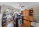 Bright home office with a crafting table, and built in storage. Natural light streams through sheer curtains at 200 Silverbelle Blvd., Longs, SC 29568