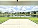 View of pond and backyard from covered patio at 2002 Sweetflag Dr., Longs, SC 29568