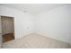 Bright and open bedroom featuring a closet and an en-suite door at 2002 Sweetflag Dr., Longs, SC 29568