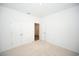 Bedroom with a door to the hall and a double door closet provides space and convenience at 2002 Sweetflag Dr., Longs, SC 29568