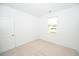 Bright, airy bedroom with a window providing a neighborhood view and natural light at 2002 Sweetflag Dr., Longs, SC 29568