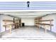 Spacious garage with shelving at 2002 Sweetflag Dr., Longs, SC 29568