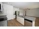 Bright kitchen with stainless appliances, granite counters, and an island providing ample workspace and storage at 2002 Sweetflag Dr., Longs, SC 29568