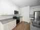 Gourmet kitchen with white cabinets, stainless steel appliances, and granite countertops at 2002 Sweetflag Dr., Longs, SC 29568