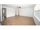 Hardwood flooring, neutral walls and trim with connecting doorway to the rest of the home at 2002 Sweetflag Dr., Longs, SC 29568