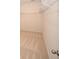 Spacious walk-in closet featuring neutral carpeting and ample shelving for optimal storage at 2002 Sweetflag Dr., Longs, SC 29568