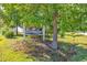 Carriage Lane community sign surrounded by mature trees and lush landscaping at 201 Surrey Ln., Myrtle Beach, SC 29579