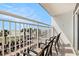 Balcony seating overlooks the beach and lounge chairs at 2201 S Ocean Blvd. # 103, Myrtle Beach, SC 29577
