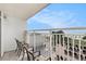 Balcony seating overlooking the beach and patio at 2201 S Ocean Blvd. # 103, Myrtle Beach, SC 29577