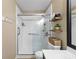 Bathroom featuring a walk-in shower with grab bars, vanity, and neutral wall color at 221 Tibton Circle, Myrtle Beach, SC 29588