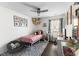 Bedroom featuring a single bed, desk, and window with natural lighting at 221 Tibton Circle, Myrtle Beach, SC 29588