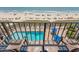 Balcony view overlooking a pool and the ocean, providing a serene spot to relax and enjoy the scenery at 2311 S Ocean Blvd. # 437, Myrtle Beach, SC 29577