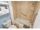 Accessible bathroom with a tub-shower combination and safety handrails at 2311 S Ocean Blvd. # 437, Myrtle Beach, SC 29577