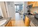 Efficient kitchen leading to the bright living area with ocean views and balcony at 2311 S Ocean Blvd. # 437, Myrtle Beach, SC 29577