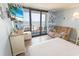 Comfortable living area with ocean views, nautical decor, and a balcony, creating a perfect relaxing space at 2311 S Ocean Blvd. # 437, Myrtle Beach, SC 29577